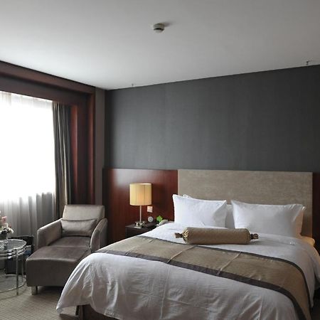 Wuhan Junyi Dynasty Hotel Rom bilde