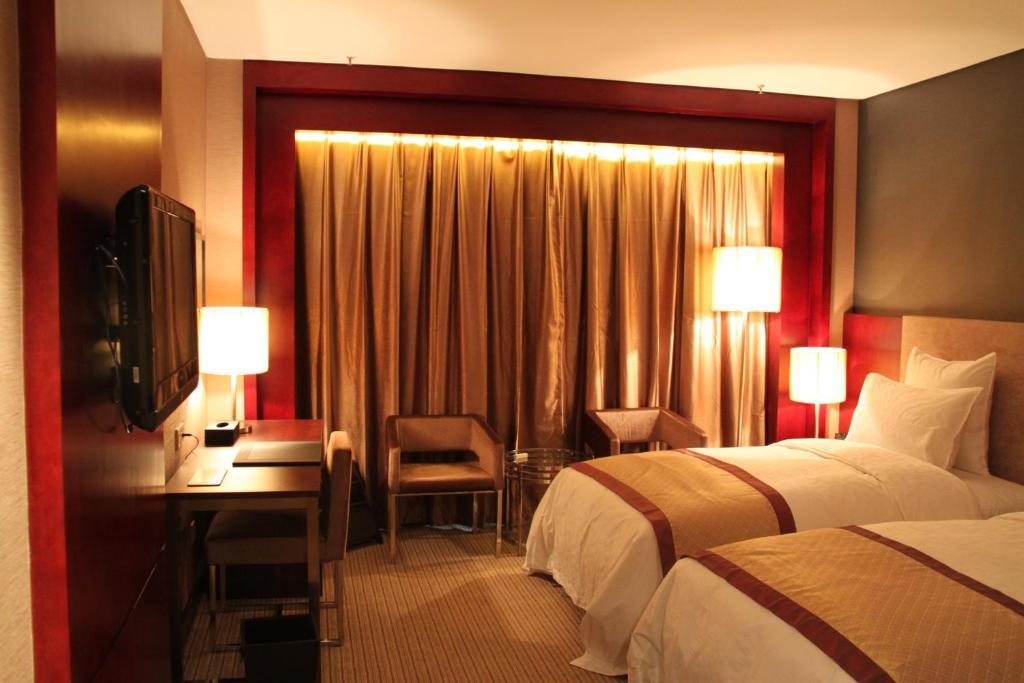 Wuhan Junyi Dynasty Hotel Rom bilde